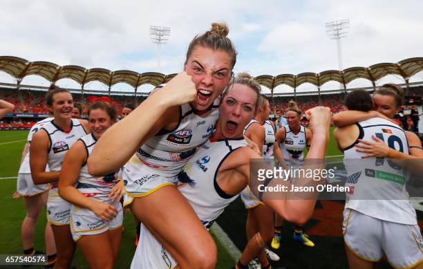 Ebony Marinoff and Talia Radan of the crows celebrate during the AFL Women's Grand Final between the Brisbane Lions and the Adelaide Crows on March...