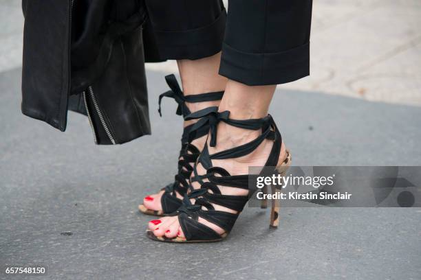 Kabuki store owner and fashion buyer Elina Halimi wears Azzedine Alaia shoes day 2 of Paris Haute Couture Fashion Week Autumn/Winter 2016, on July 4,...