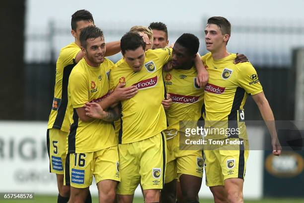 Mariners players celebrate a goal during the round 24 A-League match between Central Coast Mariners and Adelaide United at Central Coast Stadium on...