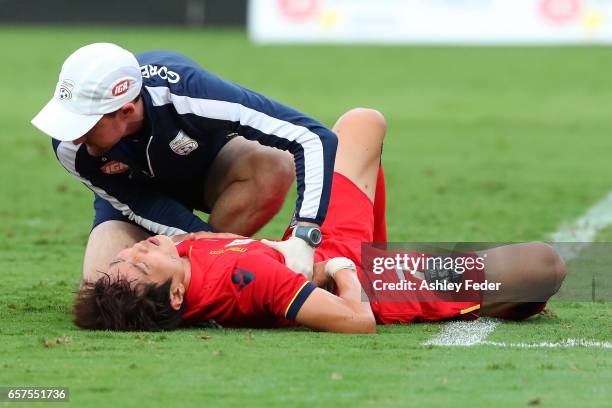 JaeSung Kim of Adelaide lays on the ground during the round 24 A-League match between Central Coast Mariners and Adelaide United at Central Coast...