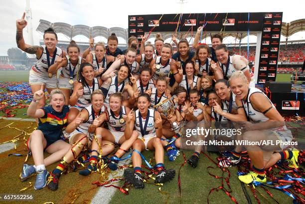 The Crows celebrate after winning the inaugural AFLW Premiership during the 2017 AFLW Grand Final match between the Brisbane Lions and the Adelaide...