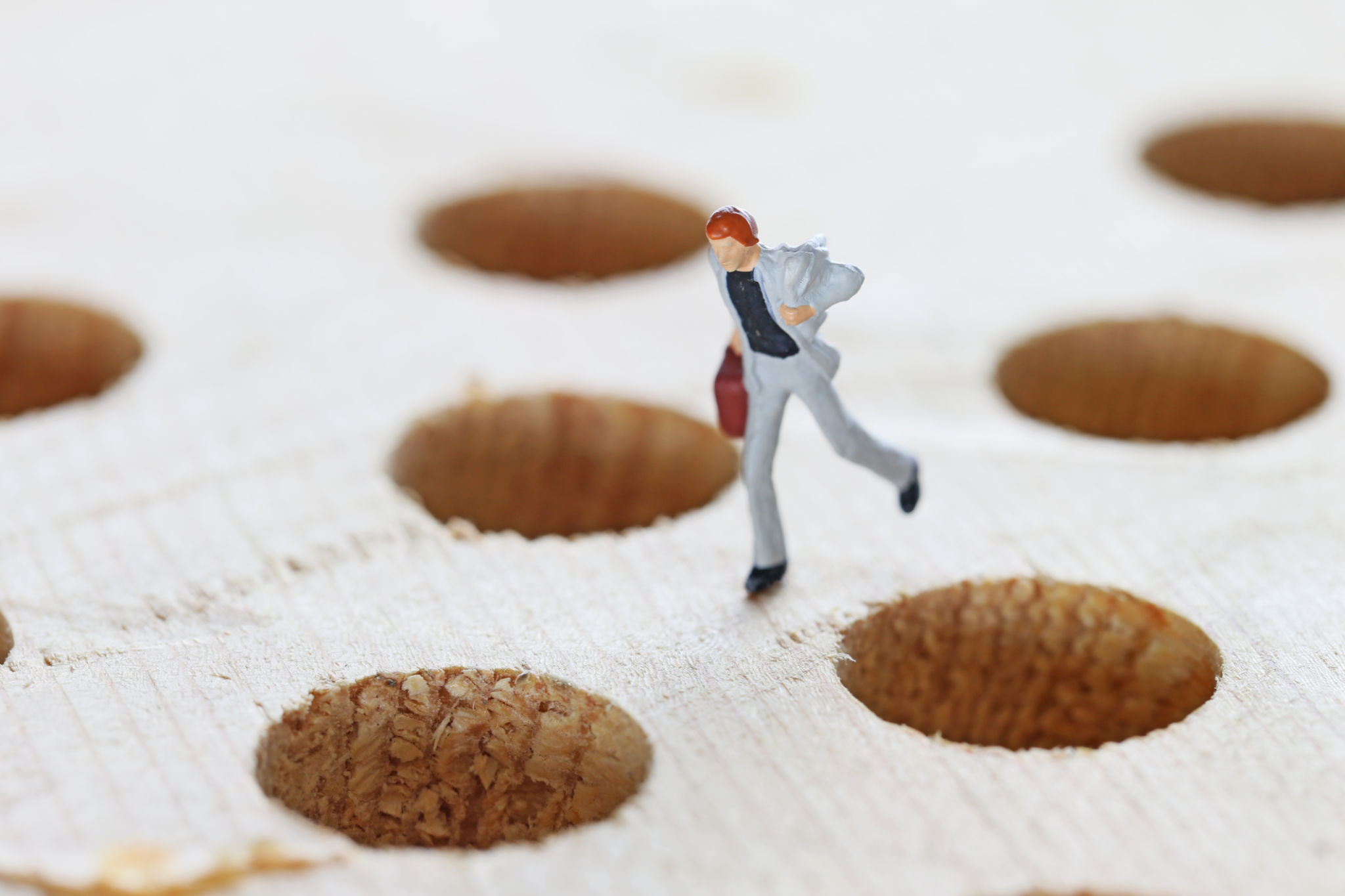 Businessmen of the pitfalls and miniature Businessmen of the pitfalls and miniature