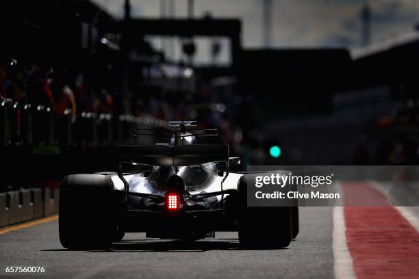 Lewis Hamilton of Great Britain driving the Mercedes AMG Petronas F1 Team Mercedes F1 WO8 in the Pitlane during final practice for the Australian...