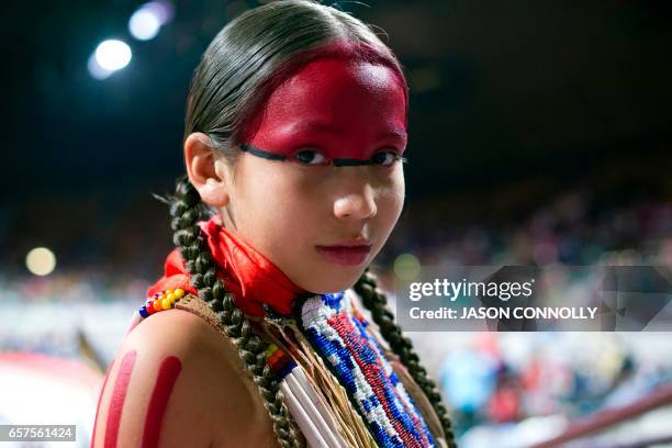 King Ramos of the Oglala Lakota Nation poses for a portrait prior to the Grand Entry during the Denver March Powwow on March 24, 2017 in Denver,...