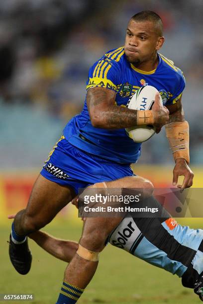 Manu Mau of the Eels is tackled during the round four NRL match between the Parramatta Eels and the Cronulla Sharks at ANZ Stadium on March 25, 2017...