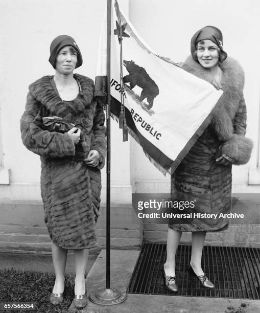 Two Young Women Presenting California State Flag to U.S. President Herbert Hoover, Washington DC, USA, National Photo Company, March 1929.