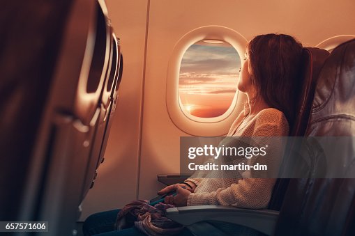 Young woman flying to France Young woman flying to France