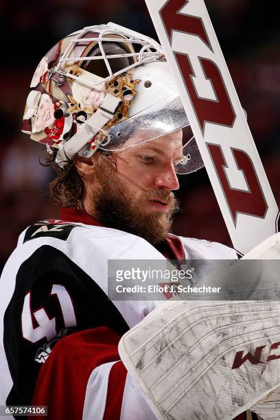 Goaltender Mike Smith of the Arizona Coyotes glides back to the net after a break in the action against the Florida Panthers at the BB&T Center on...