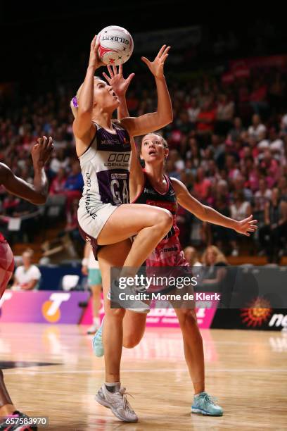 Gretel Tippett of the Firebirds shoots at goal during the round six Super Netball match between the Thunderbirds and the Firebirds at Titanium...