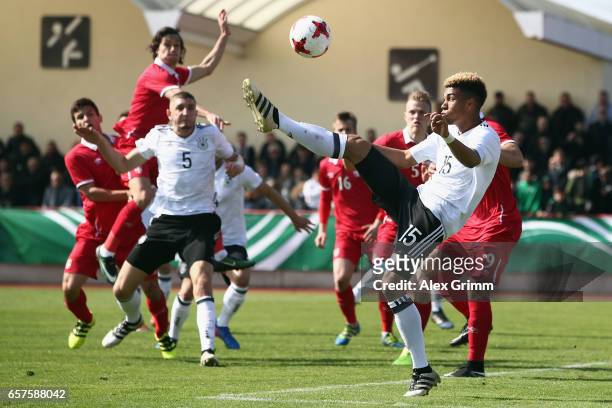 Sidney Friede of Germany kicks the ball during the UEFA Elite Round match between U19 Germany and U19 Serbia at Sportpark on March 25, 2017 in...