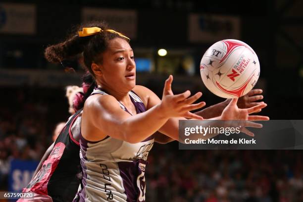 Abigail Latu-Meafou of the Firebirds wins the ball during the round six Super Netball match between the Thunderbirds and the Firebirds at Titanium...