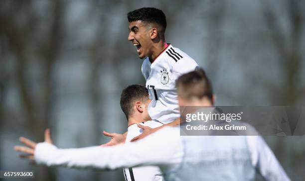 Aymen Barkok of Germany celebrates his team's first goal during the UEFA Elite Round match between U19 Germany and U19 Serbia at Sportpark on March...
