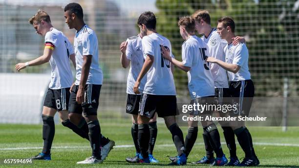 Elias Abouchabaka of Germany and Kilian Ludewig of Germany celebrate a goal during the UEFA U17 elite round match between Germany and Finland on...