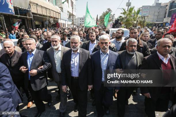 Graphic content / Yahya Sinwar , the new leader of Hamas in the Gaza Strip and senior political leaders of the Islamist movement, Ismail Haniyeh and...