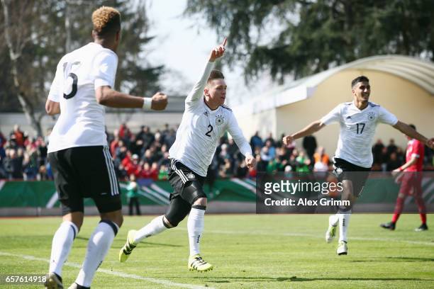 Jonas Busam of Germany celebrates his team's second goal during the UEFA Elite Round match between U19 Germany and U19 Serbia at Sportpark on March...