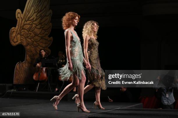 Models walk the runway at the Tuvanam show during Mercedes-Benz Istanbul Fashion Week March 2017 at Grand Pera on March 23, 2017 in Istanbul, Turkey.