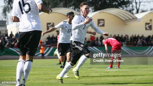 Jonas Busam of Germany celebrates his team's second goal during the UEFA Elite Round match between U19 Germany and U19 Serbia at Sportpark on March...