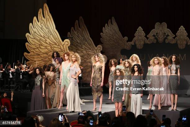 Models on the runway at the Tuvanam show during Mercedes-Benz Istanbul Fashion Week March 2017 at Grand Pera on March 23, 2017 in Istanbul, Turkey.