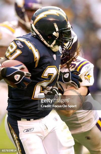 LaDainian Tomlinson of the San Diego Chargers carries the ball against the Minnesota Vikings during an NFL Football game November 9, 2003 at Jack...