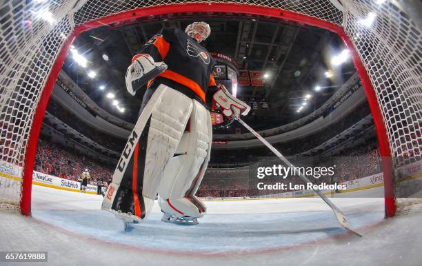 Goaltender Steve Mason of the Philadelphia Flyers gathers himself during a stoppage in play against the Pittsburgh Penguins on March 15, 2017 at the...