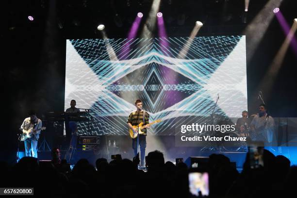 Colombian singer Juanes performs onstage a showcase to promote his new album "Mis planes son amarte" at Plaza Condesa on March 24, 2017 in Mexico...