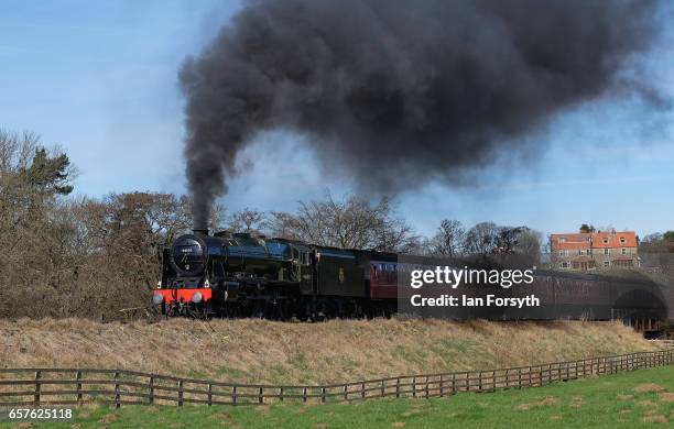 The steam locomotive Royal Scot under steam between Grosmont and Pickering on the North Yorkshire Moors Railway on March 25, 2017 in Grosmont, United...