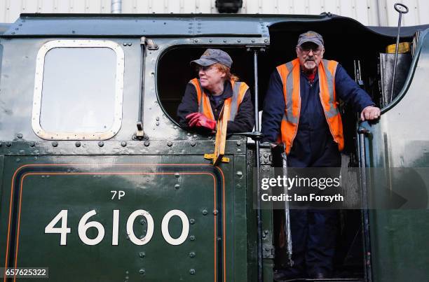 Support crew volunteers Diana Hurfurt and John Blair stand on the footplate of the steam locomotive Royal Scot in Grosmont engine sheds ahead of...