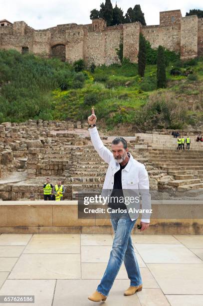 Actor Antonio Banderas poses for the photographers before receives the 'Biznaga de Oro Honorifica' award during the last day of the Malaga Film...