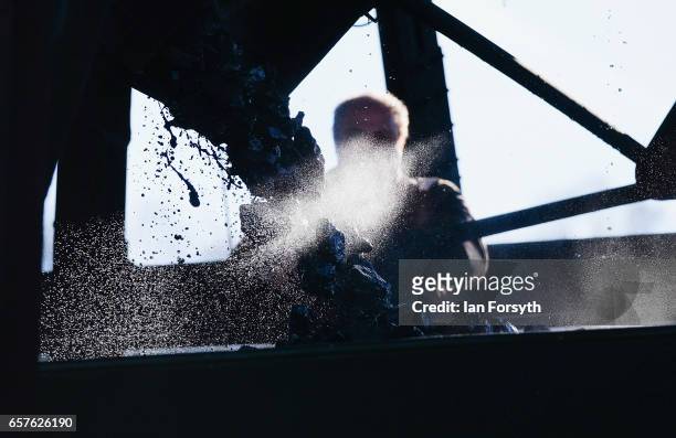 The steam locomotive Royal Scot loads up coal as it is prepared in Grosmont engine sheds ahead of running between Grosmont and Pickering on the North...