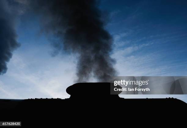 Smoke rises from the stack of the steam locomotive Royal Scot as it is prepared in Grosmont engine sheds ahead of running between Grosmont and...