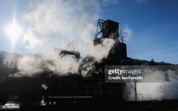 The steam locomotive Royal Scot loads up coal as it is prepared in Grosmont engine sheds ahead of running between Grosmont and Pickering on the North...