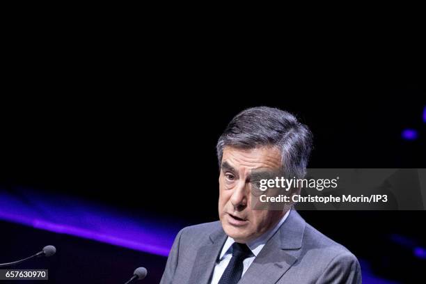 Candidate of Les Republicains right wing Party for the 2017 French Presidential Election Francois Fillon delivers a speech during a gathering of the...