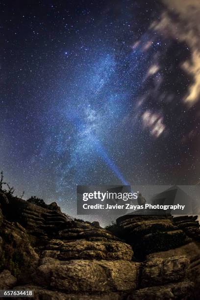man under the milky way - paraje natural torcal de antequera stock pictures, royalty-free photos & images