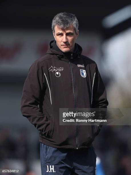 Head coach Jens Haertel of Magdeburg enters the pitch prior to the Third League match between Holstein Kiel and 1. FC Magdeburg at Holstein-Stadion...
