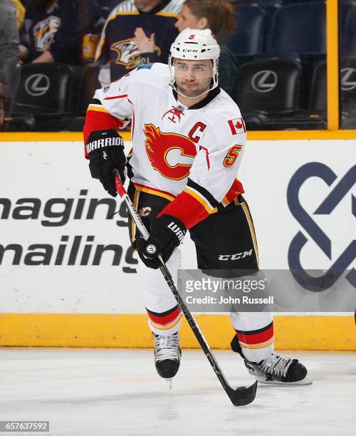 Dennis Wideman of the Calgary Flames skates against the Nashville Predators during an NHL game at Bridgestone Arena on March 23, 2017 in Nashville,...