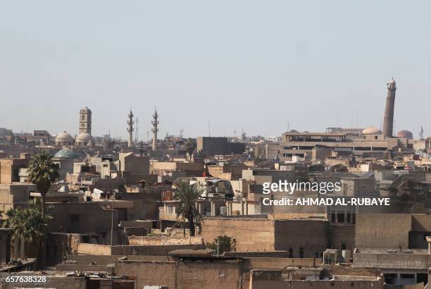 General view taken on March 25 shows the Mosul skyline featuring the historic leaning minaret in the vicinity of the Great Mosque of Al-Nuri in...