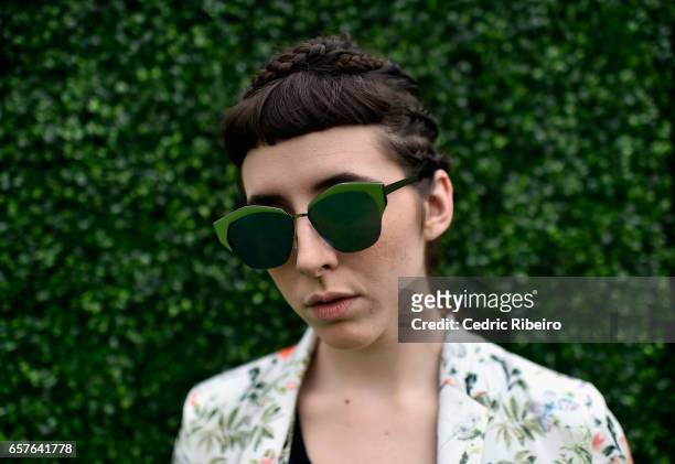 Guest, sunglasses detail, attends Fashion Forward March 2017 held at the Dubai Design District on March 25, 2017 in Dubai, United Arab Emirates.