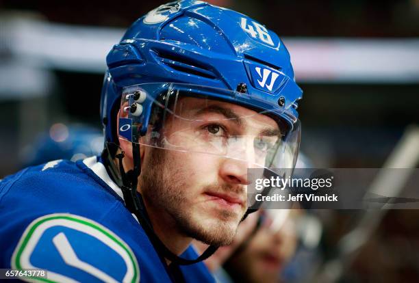 Jayson Megna of the Vancouver Canucks looks on from the bench during their NHL game against the Detroit Red Wings at Rogers Arena February 28, 2017...