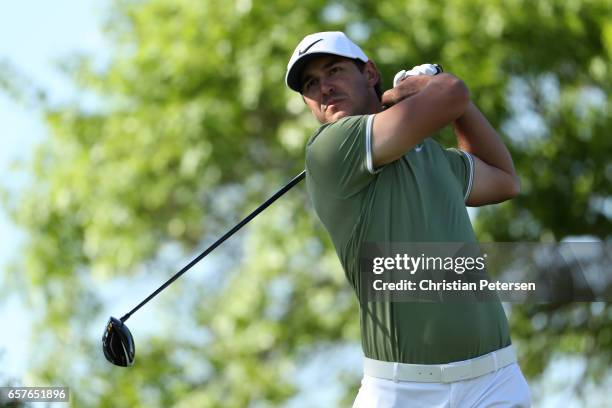 Brooks Koepka tees off on the 6th hole of his match during round four of the World Golf Championships-Dell Technologies Match Play at the Austin...