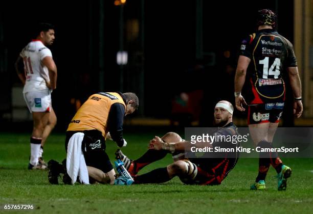Newport Gwent Dragons' Rynard Landman receives medical attention during the Guinness Pro12 Round 18 match between Newport Gwent Dragons and Ulster...