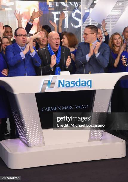 Michael Sapienza, Fashion designer Carmen Marc Valvo and NASDAQ OMX Vice President Joseph Brantuk and The Colon Cancer Alliance ring the Nasdaq Stock...