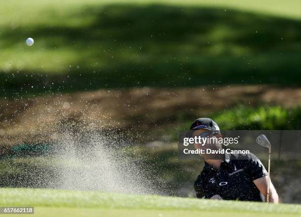 Zach Johnson of the United States plays his second shot on the par 3, seventh hole in his match against Dustin Johnson during the fourth round of the...