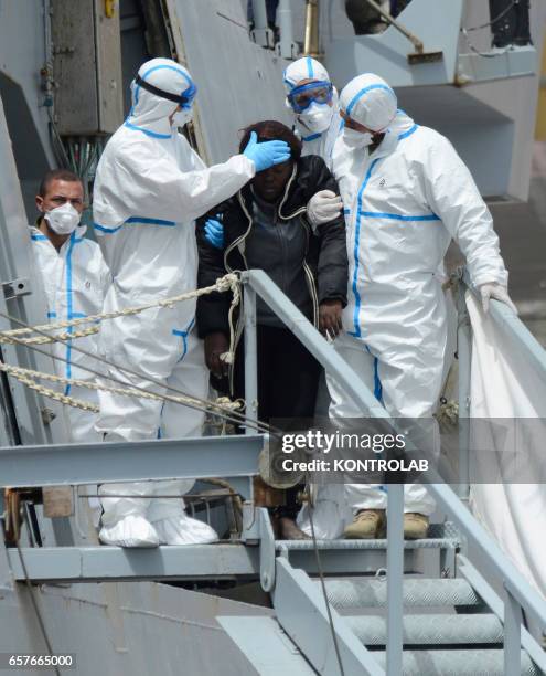 Immigrants are disembarked in Naples from rescue ship Scirocco Pilot after being saved in Mediterranean sea.