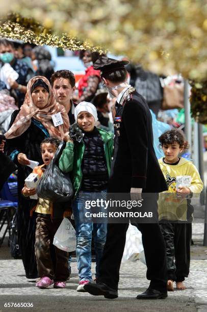 Immigrants are disembarked in Naples from rescue ship Scirocco Pilot after being saved in Mediterranean sea.