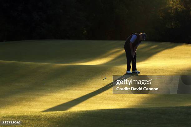 Phil Mickelson of the united States plays his fourth shot on the par 4, first hole in his match against Marc Leishman during the fourth round of the...
