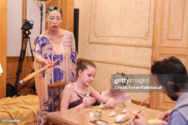 Models pose for a presentation at the Bashaques show during Mercedes-Benz Istanbul Fashion Week March 2017 at Grand Pera on March 23, 2017 in...