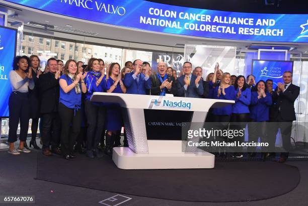 Fashion designer Carmen Marc Valvo and The Colon Cancer Alliance ring the Nasdaq Stock Market Opening Bell at NASDAQ on March 24, 2017 in New York...