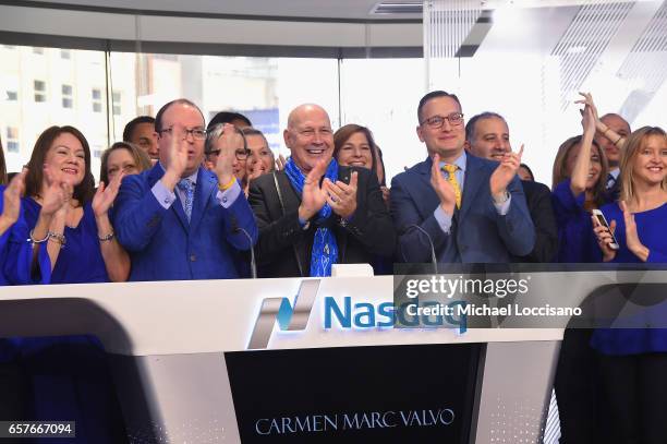 Michael Sapienza, Fashion designer Carmen Marc Valvo and NASDAQ OMX Vice President Joseph Brantuk and The Colon Cancer Alliance ring the Nasdaq Stock...