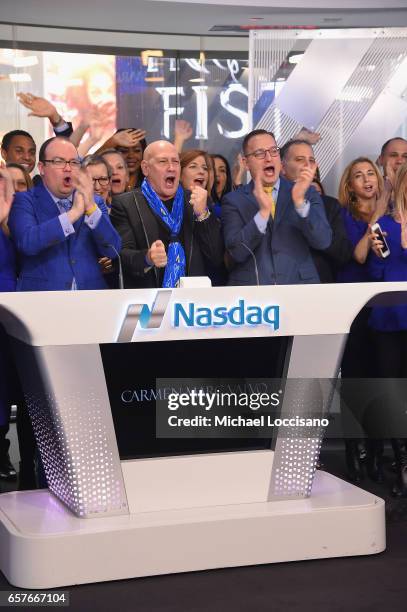 Michael Sapienza, Fashion designer Carmen Marc Valvo and NASDAQ OMX Vice President Joseph Brantuk and The Colon Cancer Alliance ring the Nasdaq Stock...