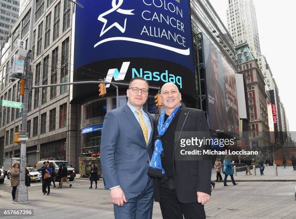 Vice President Joseph Brantuk and Fashion designer Carmen Marc Valvo pose outside NASDAQ after ringing the Nasdaq Stock Market Opening Bell at NASDAQ...
